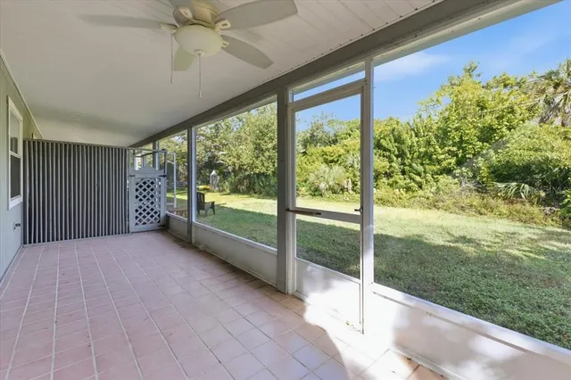a view of a room with a large window