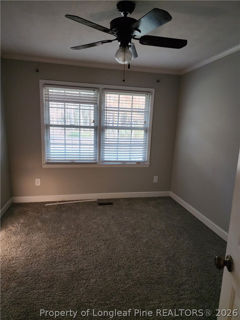1303 Middle Road Fayetteville, NC 28312 - Photo 14 of 17 a view of an empty room with a window