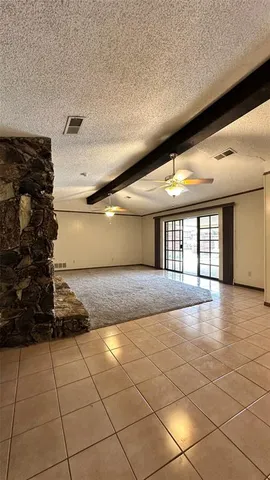 a kitchen with a refrigerator and a sink