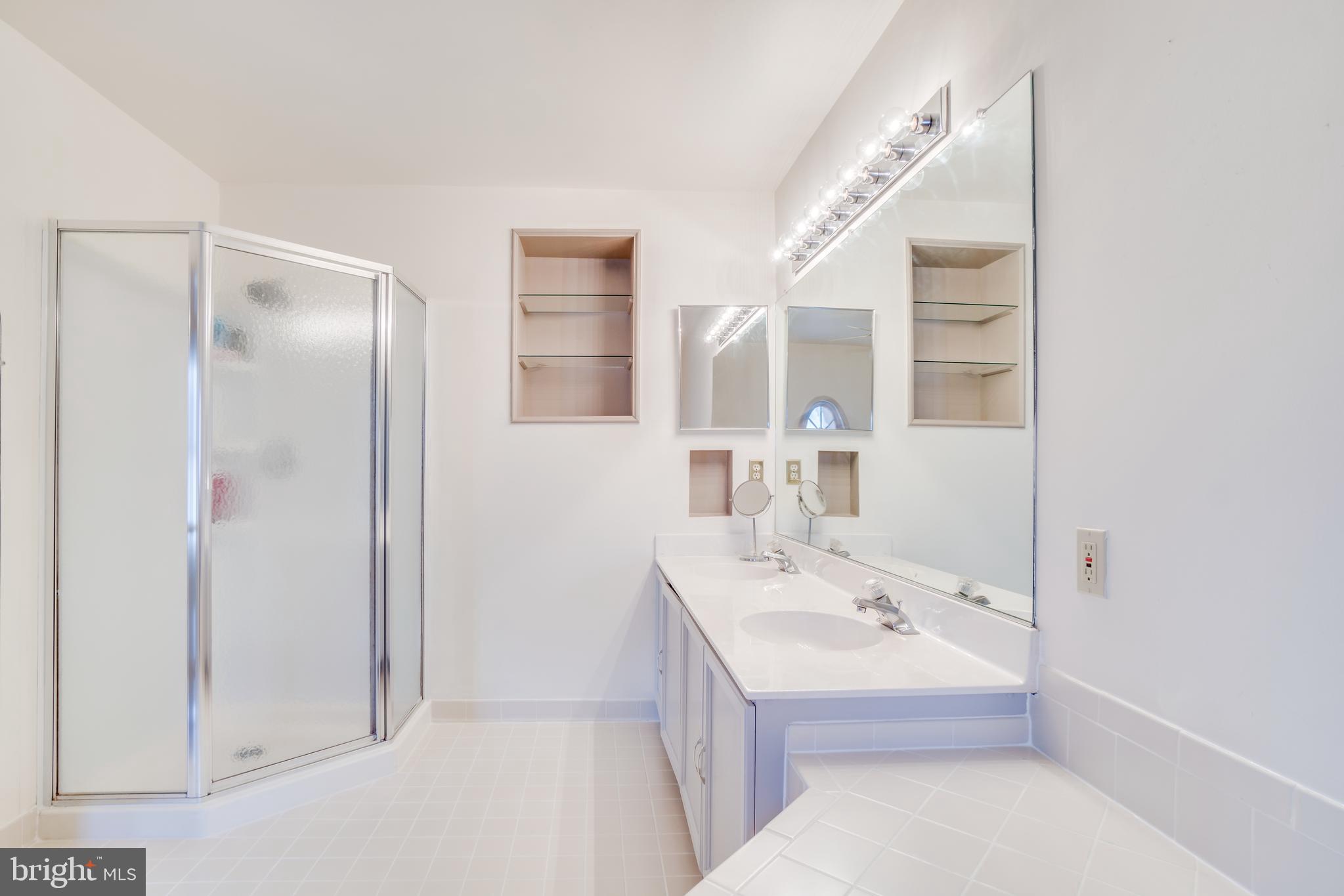 8321 Ridge Crossing Lane Springfield, VA 22152 - Photo 23 of 33 dual vanity & separate standup shower