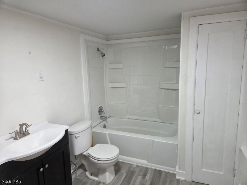 441 Rutherford Avenue Franklin, NJ 07416 - Photo 7 of 7 a bathroom with a sink a toilet and shower