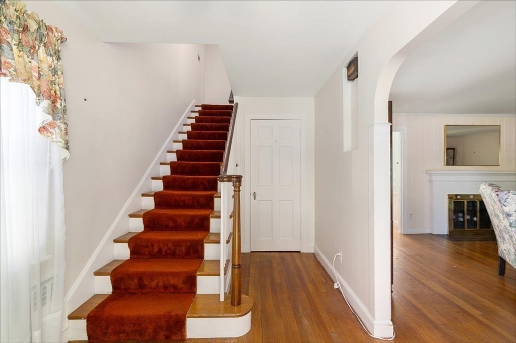 751 Brook Road Milton, MA 02186 - Photo 11 of 20 a view of entryway with wooden floor