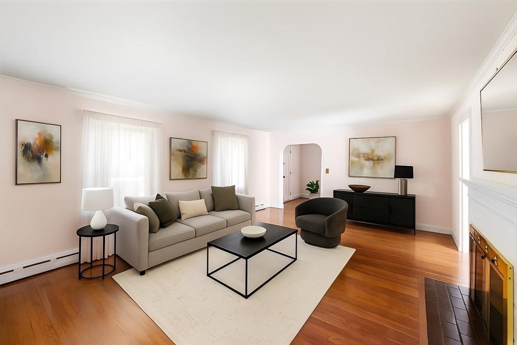 751 Brook Road Milton, MA 02186 - Photo 7 of 20 a living room with furniture and a couch