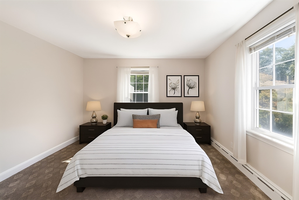 751 Brook Road Milton, MA 02186 - Photo 8 of 20 a bedroom with a bed and a window