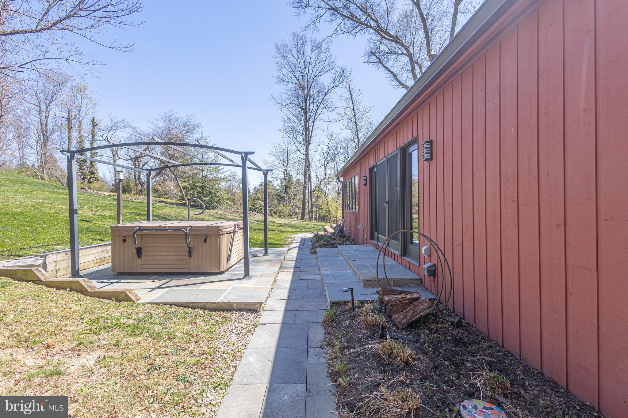 101 Rogers Road Furlong, PA 18925 - Photo 45 of 57 Outdoor Hot Tub / Spa / Blue Stone Walkway