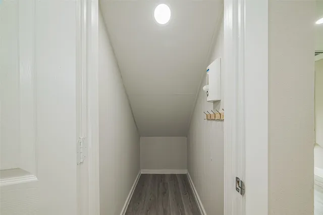 a view of entryway with wooden floor