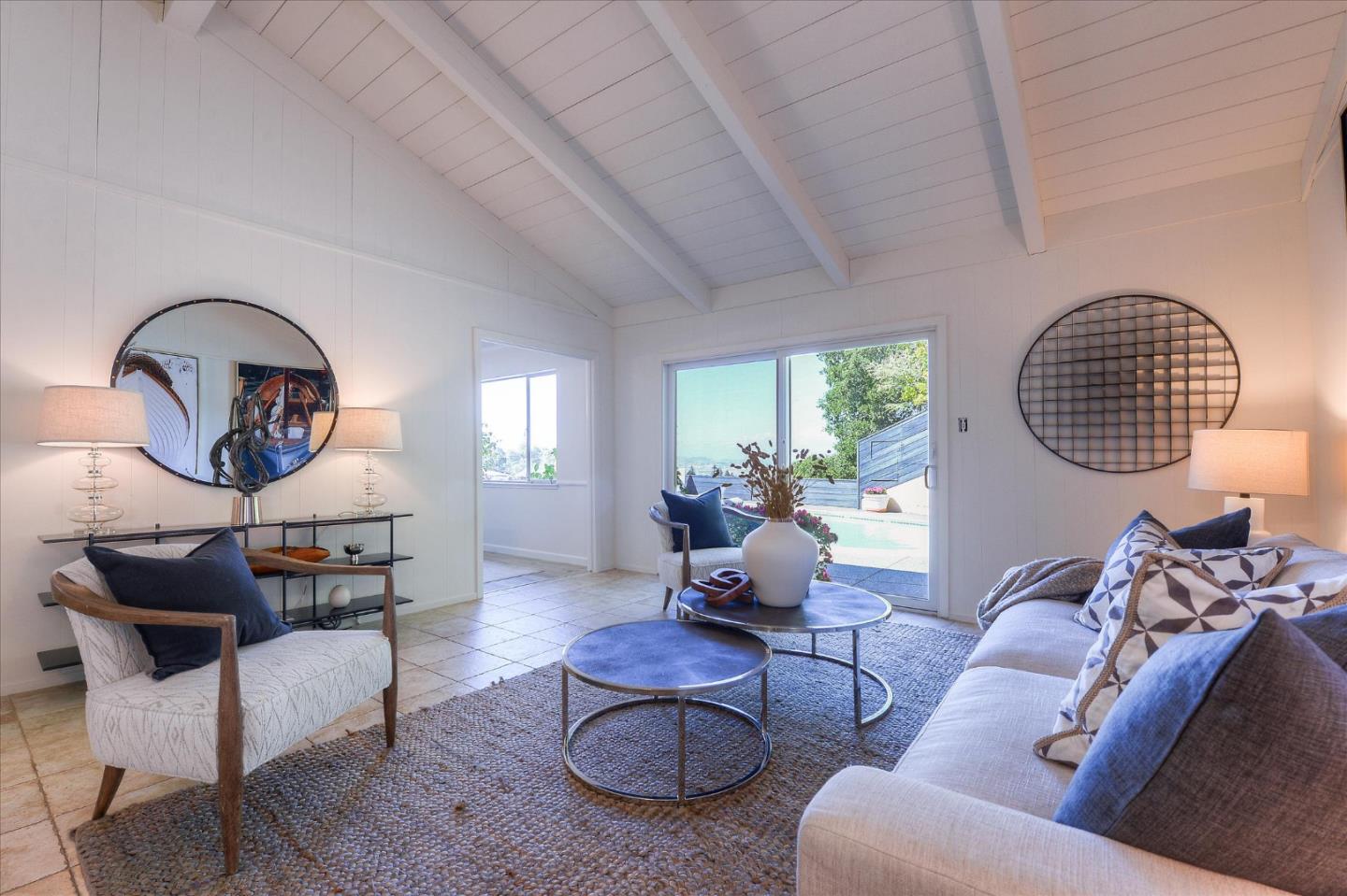 2620 Summit Drive Burlingame, CA 94010 - Photo 17 of 49 a living room with furniture a rug a lamp and a large window