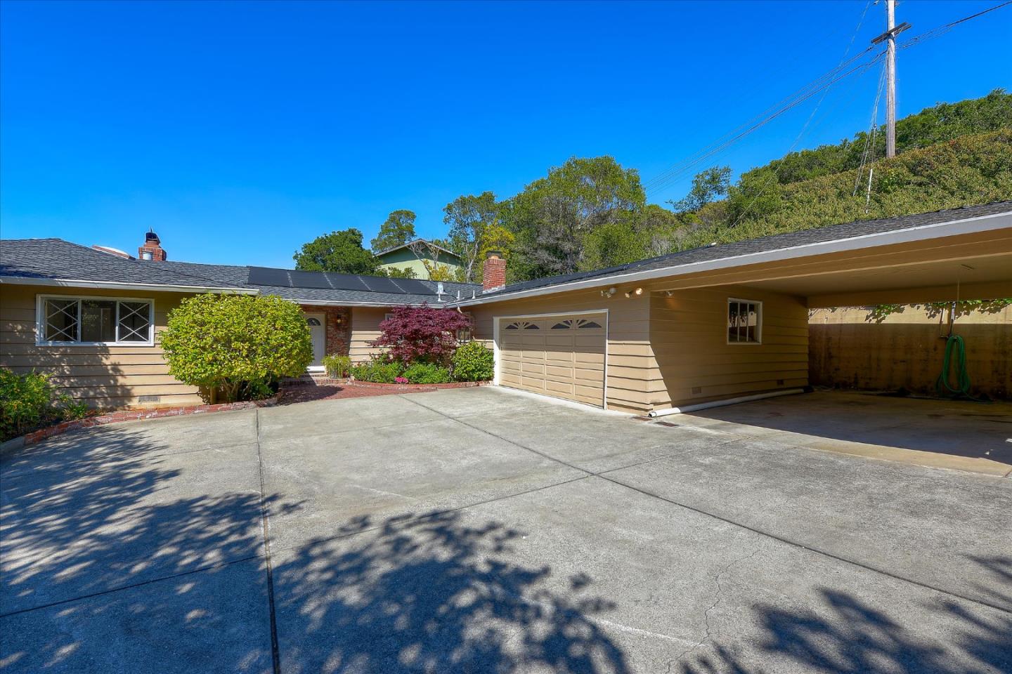 2620 Summit Drive Burlingame, CA 94010 - Photo 2 of 49 a view of a house with a yard