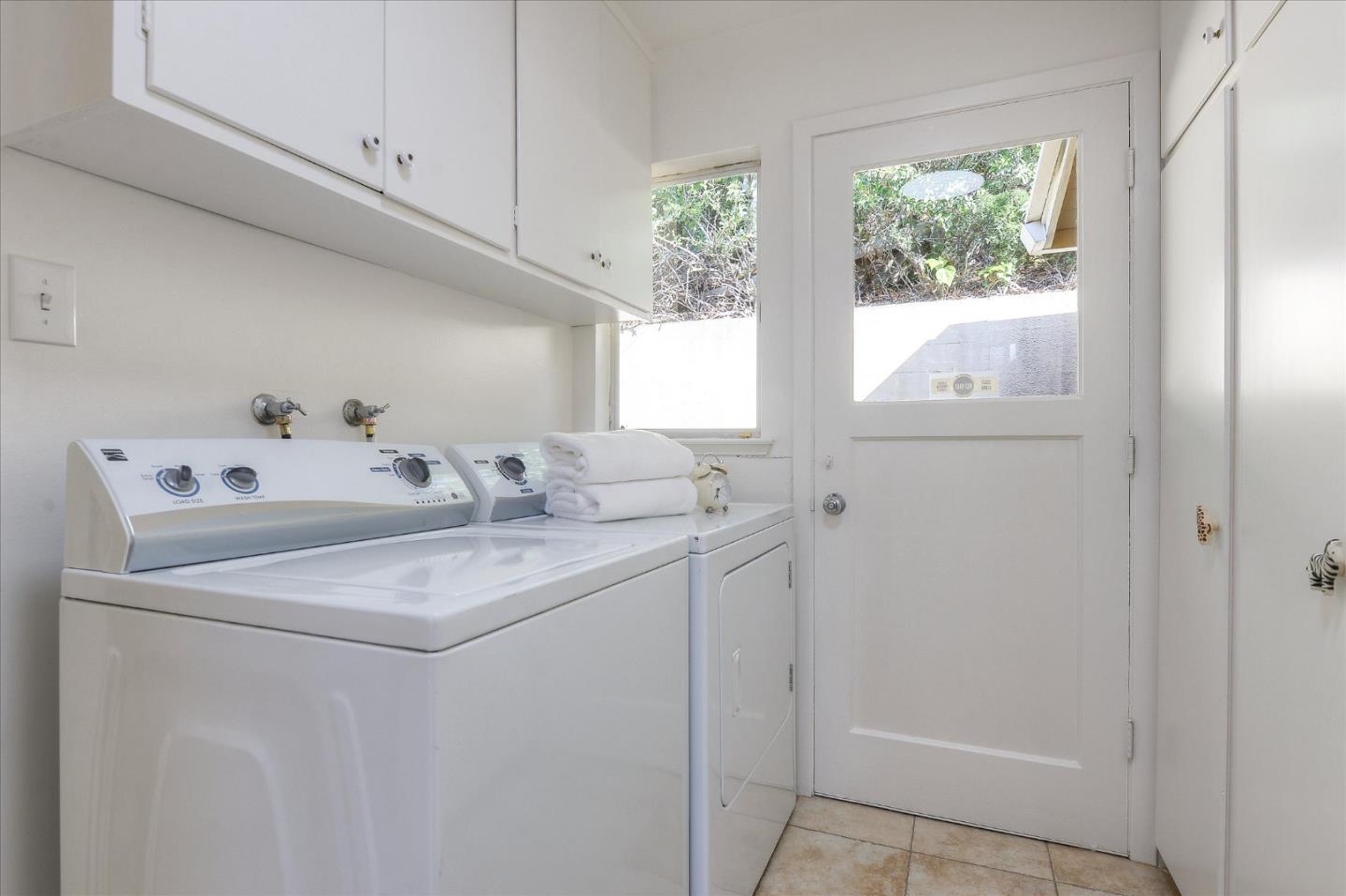 2620 Summit Drive Burlingame, CA 94010 - Photo 25 of 49 a utility room with closet dryer and washer
