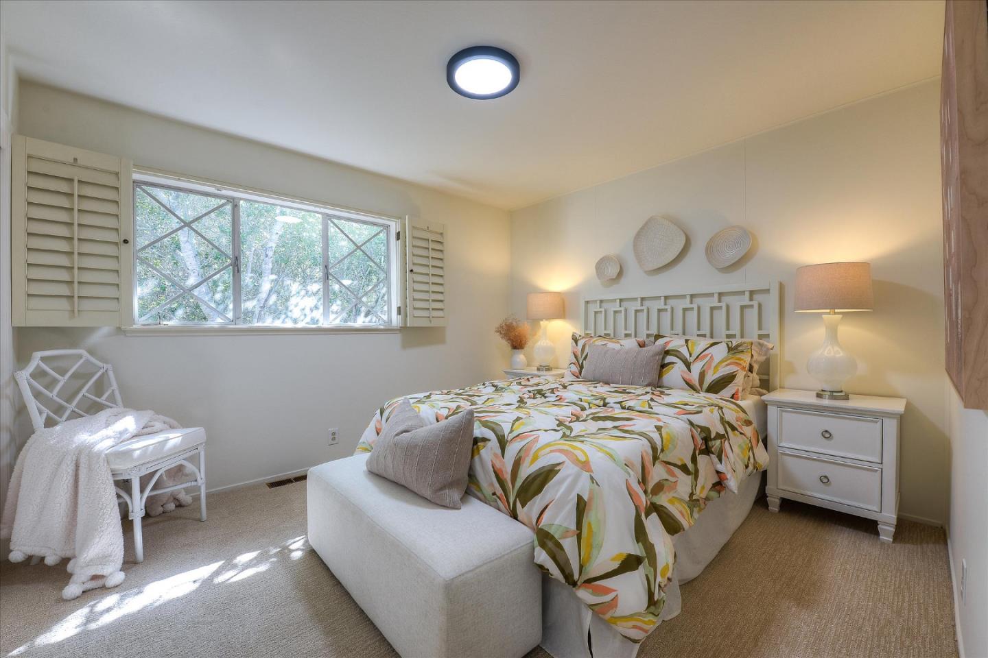 2620 Summit Drive Burlingame, CA 94010 - Photo 29 of 49 a bedroom with a bed and a window