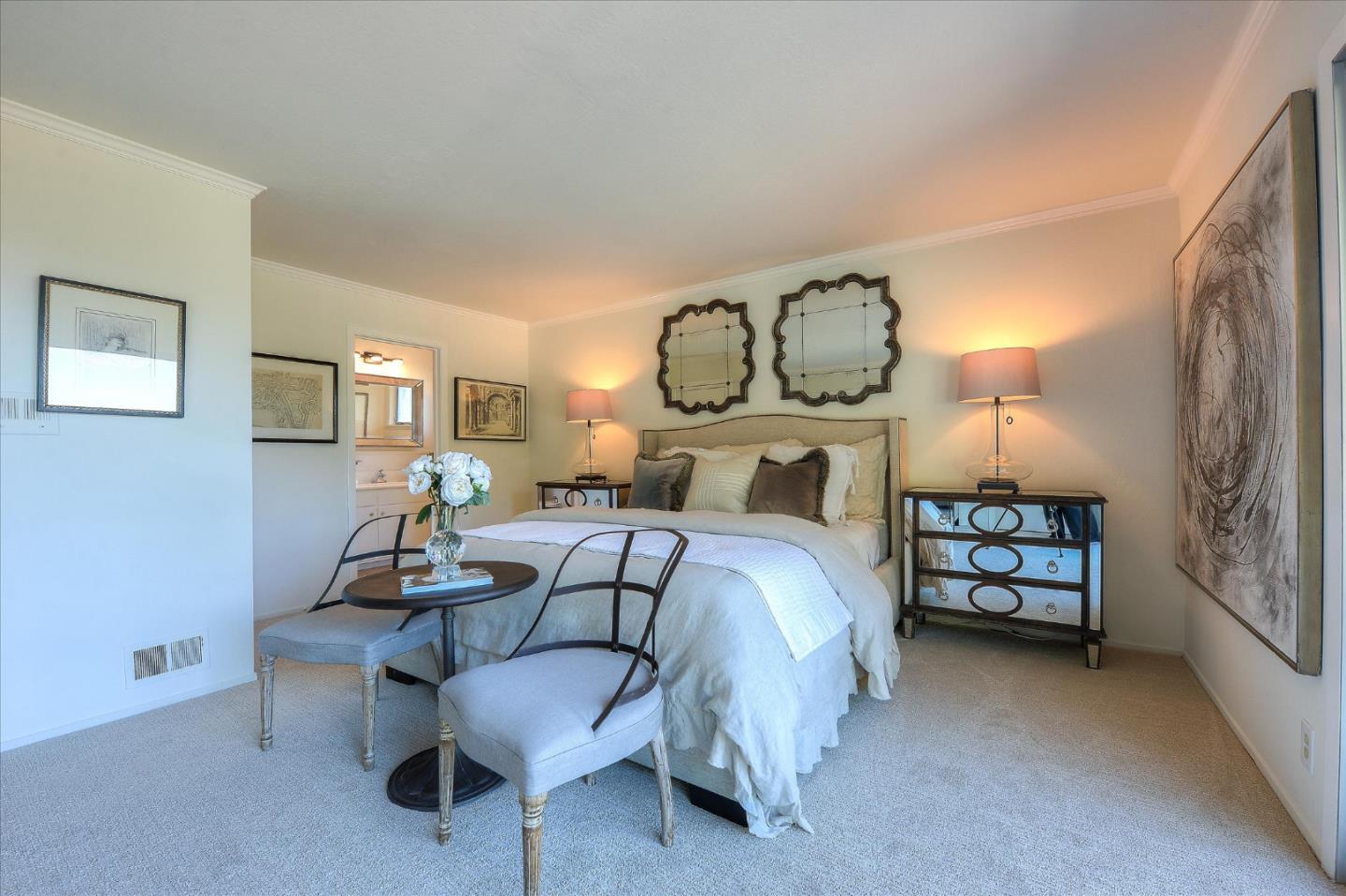 2620 Summit Drive Burlingame, CA 94010 - Photo 33 of 49 a bedroom with a bed and a chandelier