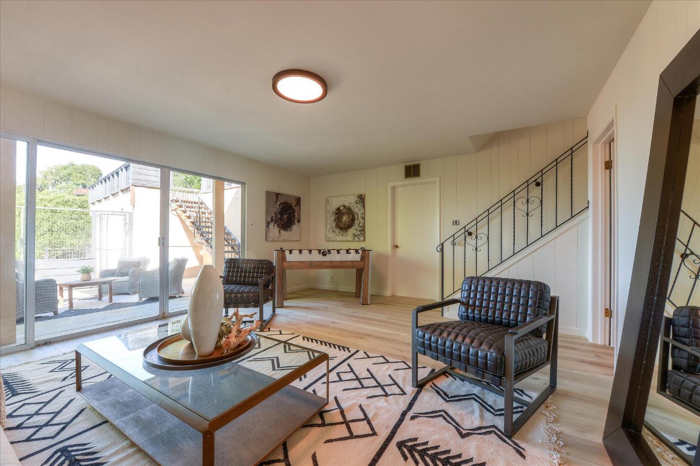 2620 Summit Drive Burlingame, CA 94010 - Photo 38 of 49 a living room with furniture and a table
