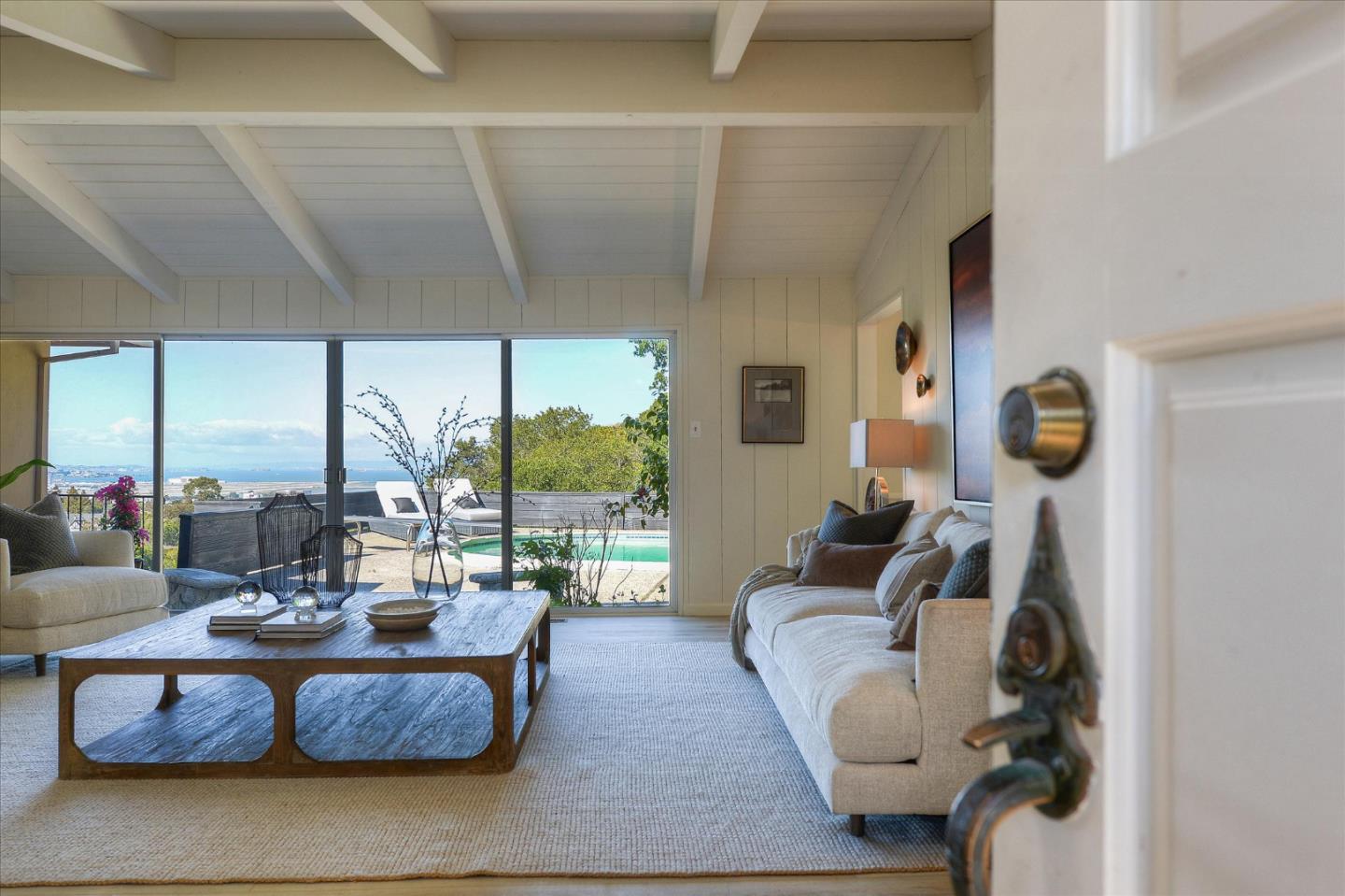 2620 Summit Drive Burlingame, CA 94010 - Photo 4 of 49 a living room with furniture and a floor to ceiling window