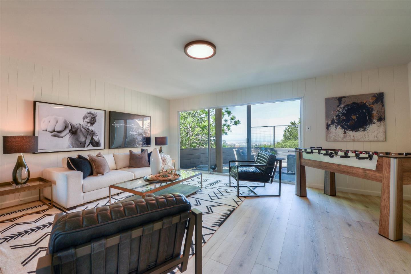 2620 Summit Drive Burlingame, CA 94010 - Photo 42 of 49 a living room with furniture and a large window