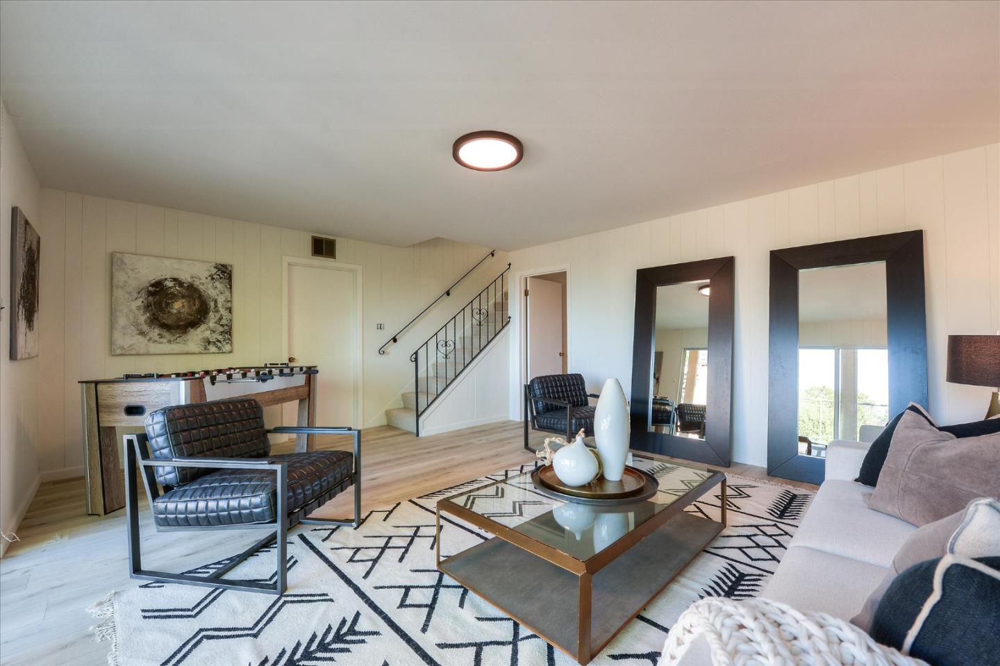 2620 Summit Drive Burlingame, CA 94010 - Photo 45 of 49 a living room with furniture and a potted plant