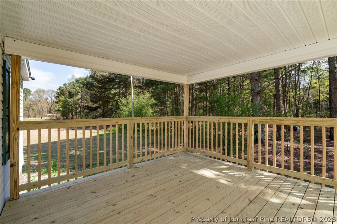 515 Mt Zion Road Red Springs, NC 28377 - Photo 28 of 50 a view of a balcony with wooden floor