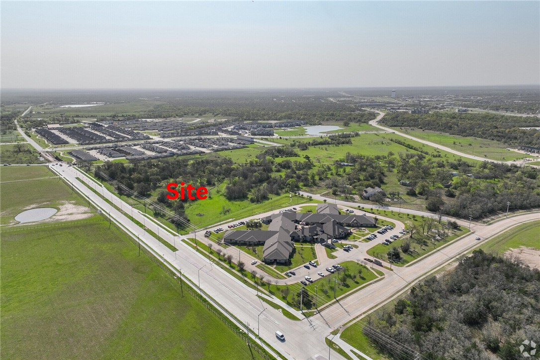 3906 Rock Prairie Road College Station, TX 77845 - Photo 5 of 10 an aerial view of residential houses with outdoor space