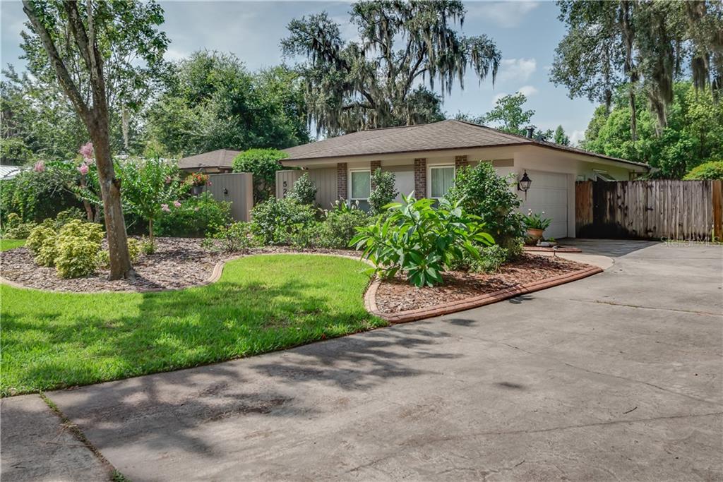 525 Devonshire Boulevard Longwood, FL 32750 - Photo 1 of 1 Front Exterior of Home - Side entry garage