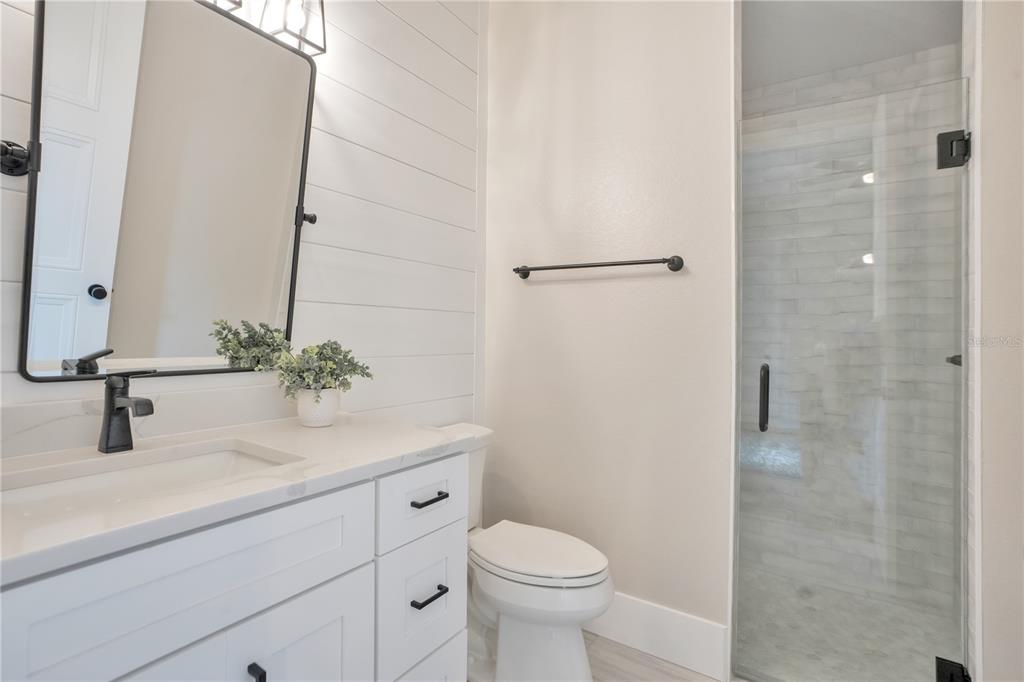 440 Palma Ceia Road Winter Haven, FL 33884 - Photo 46 of 78 a bathroom with a sink a toilet and shower
