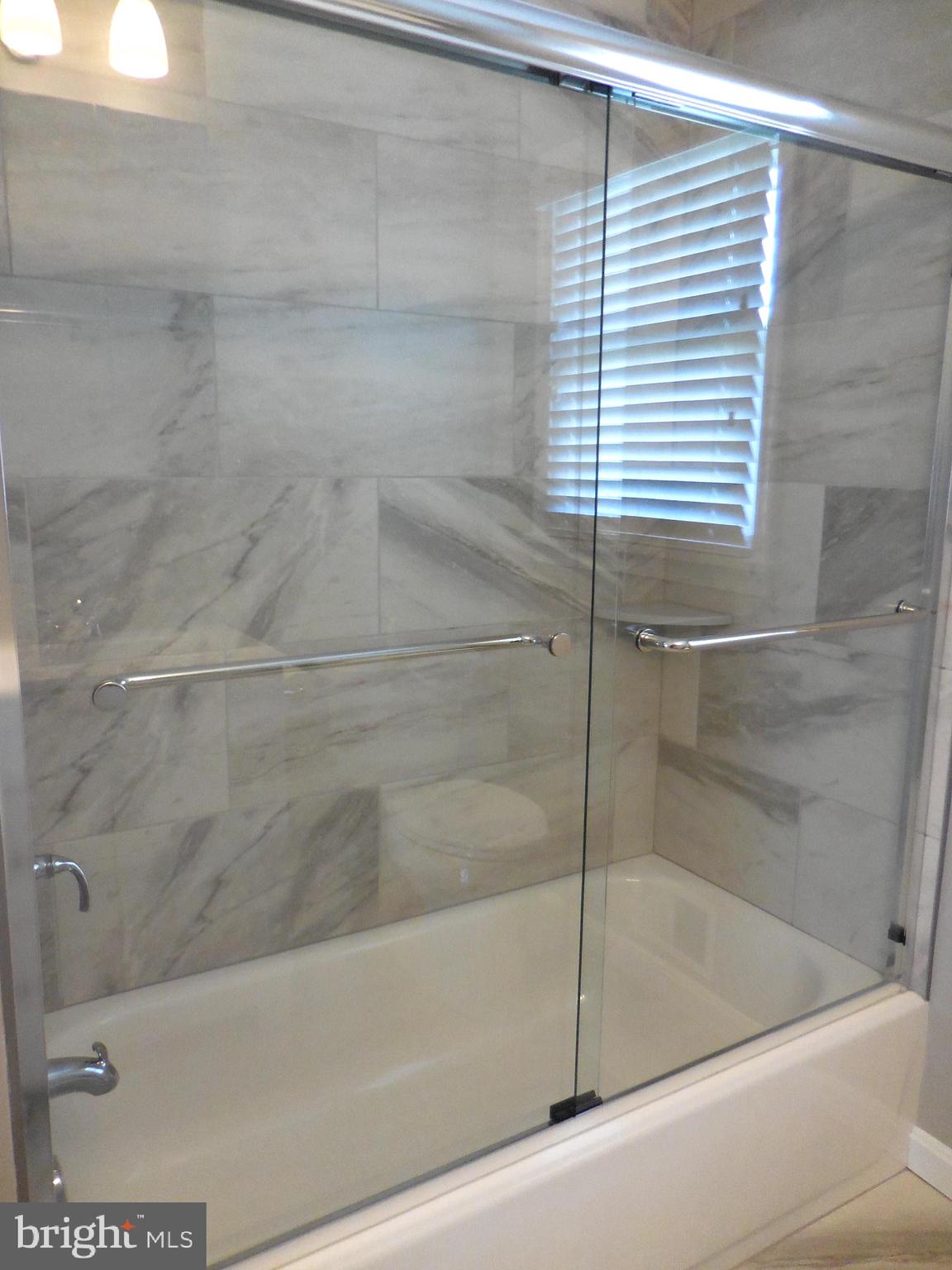 724 East Maple Road Linthicum, MD 21090 - Photo 27 of 27 Brand new bath and shower.