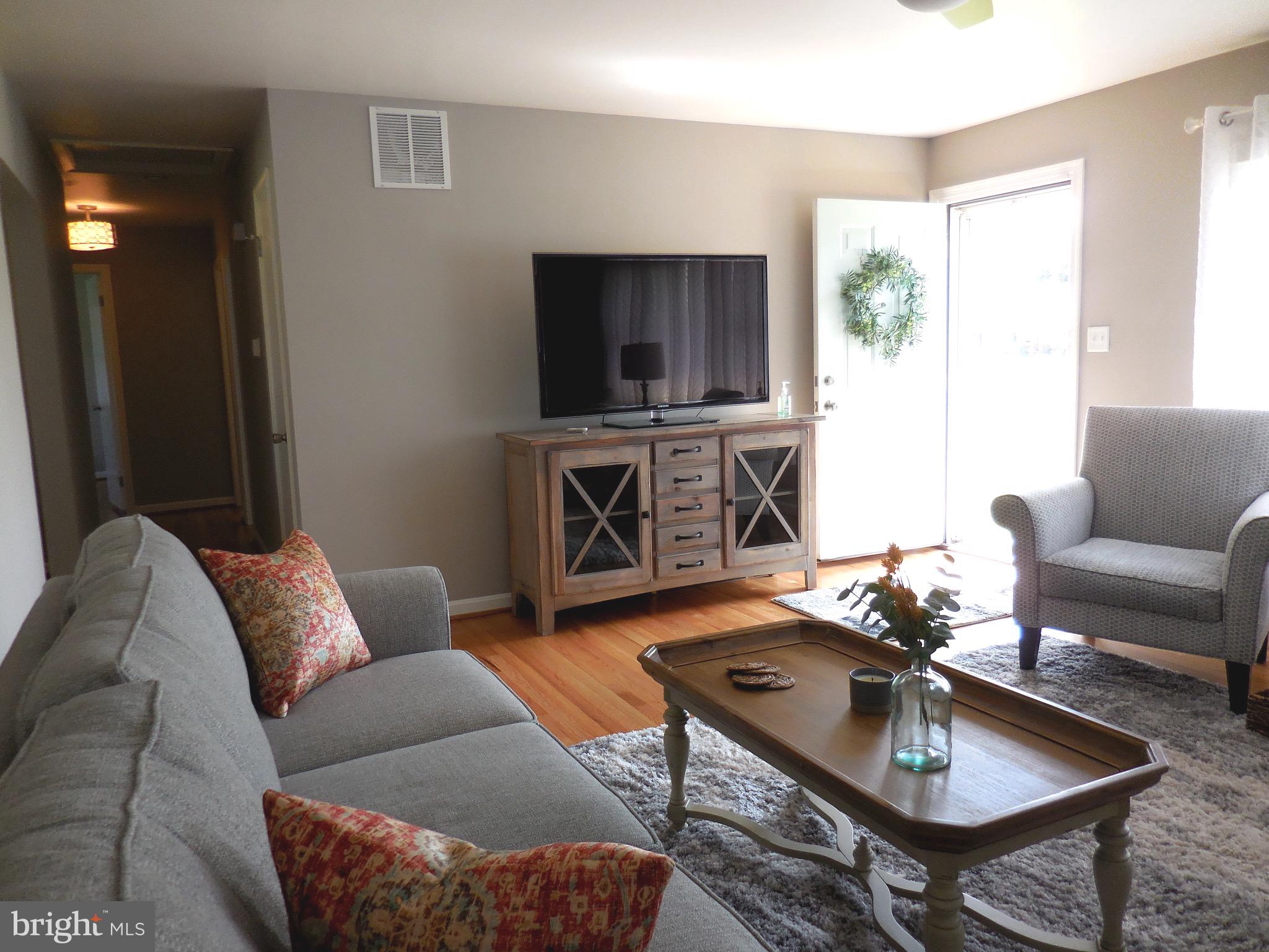 724 East Maple Road Linthicum, MD 21090 - Photo 7 of 27 Living room and all furniture conveys.