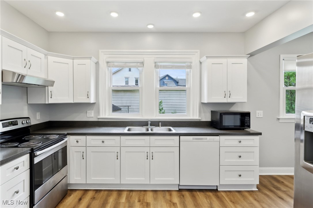 25 Taylor Road Bedford, OH 44146 - Photo 8 of 33 1st floor kitchen with ss appliances