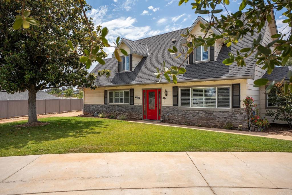 2430 Geyer Lane Alpine, CA 91901 - Photo 57 of 60 a front view of a house with a yard and a garage