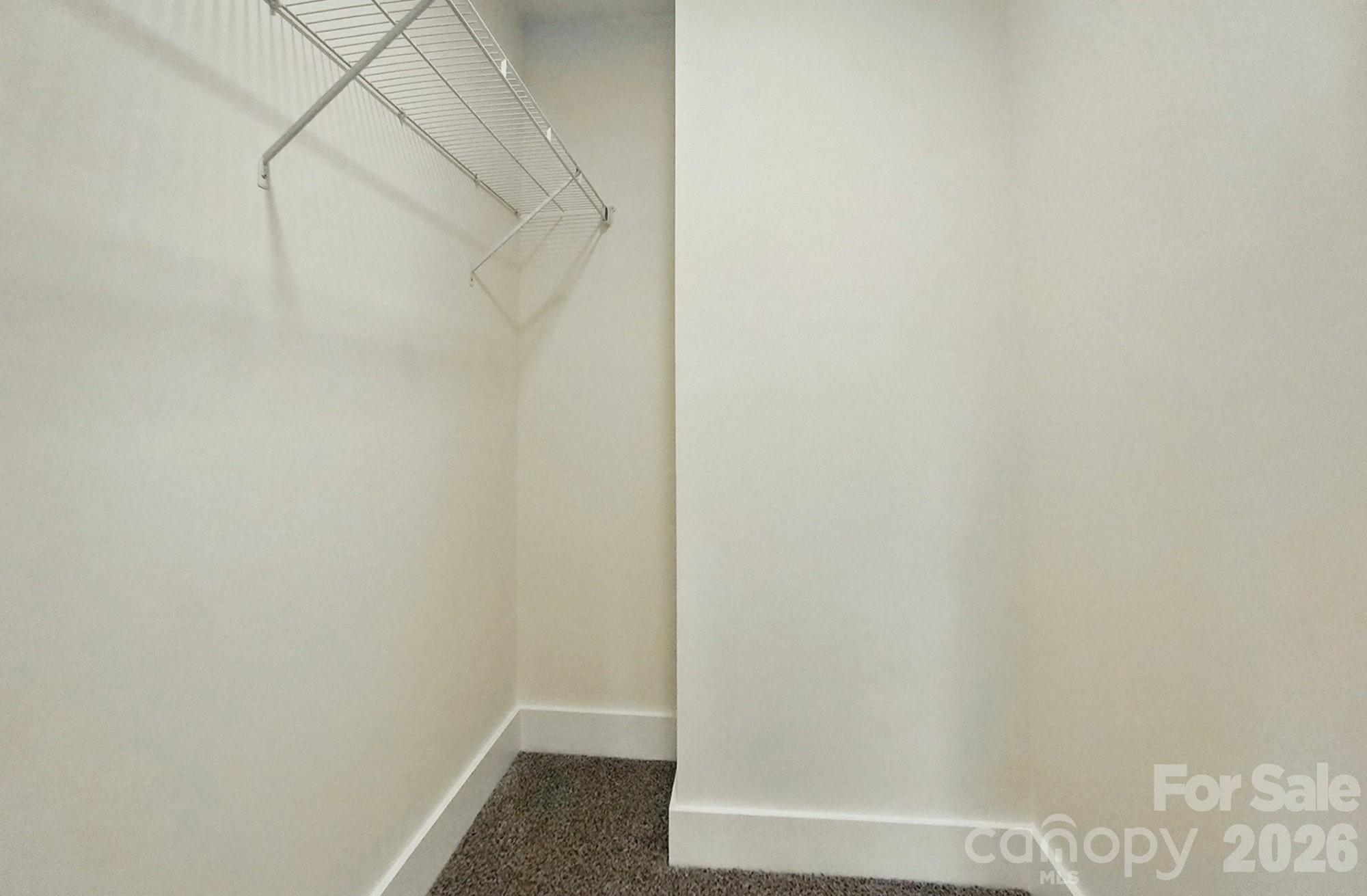 274 Bellhaven Place Northwest Concord, NC 28027 - Photo 19 of 27 a view of small space with empty racks