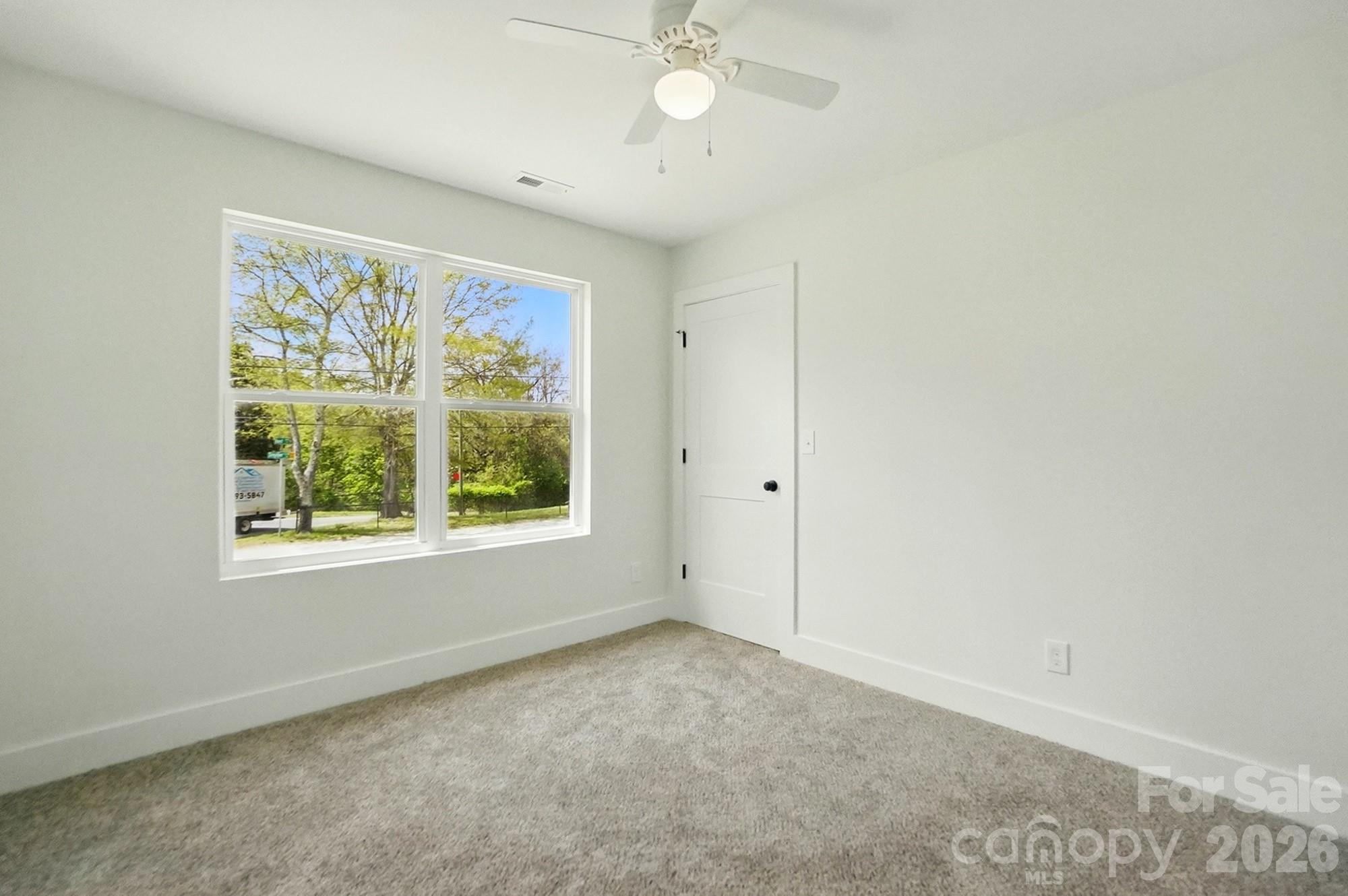 274 Bellhaven Place Northwest Concord, NC 28027 - Photo 22 of 27 an empty room with a window