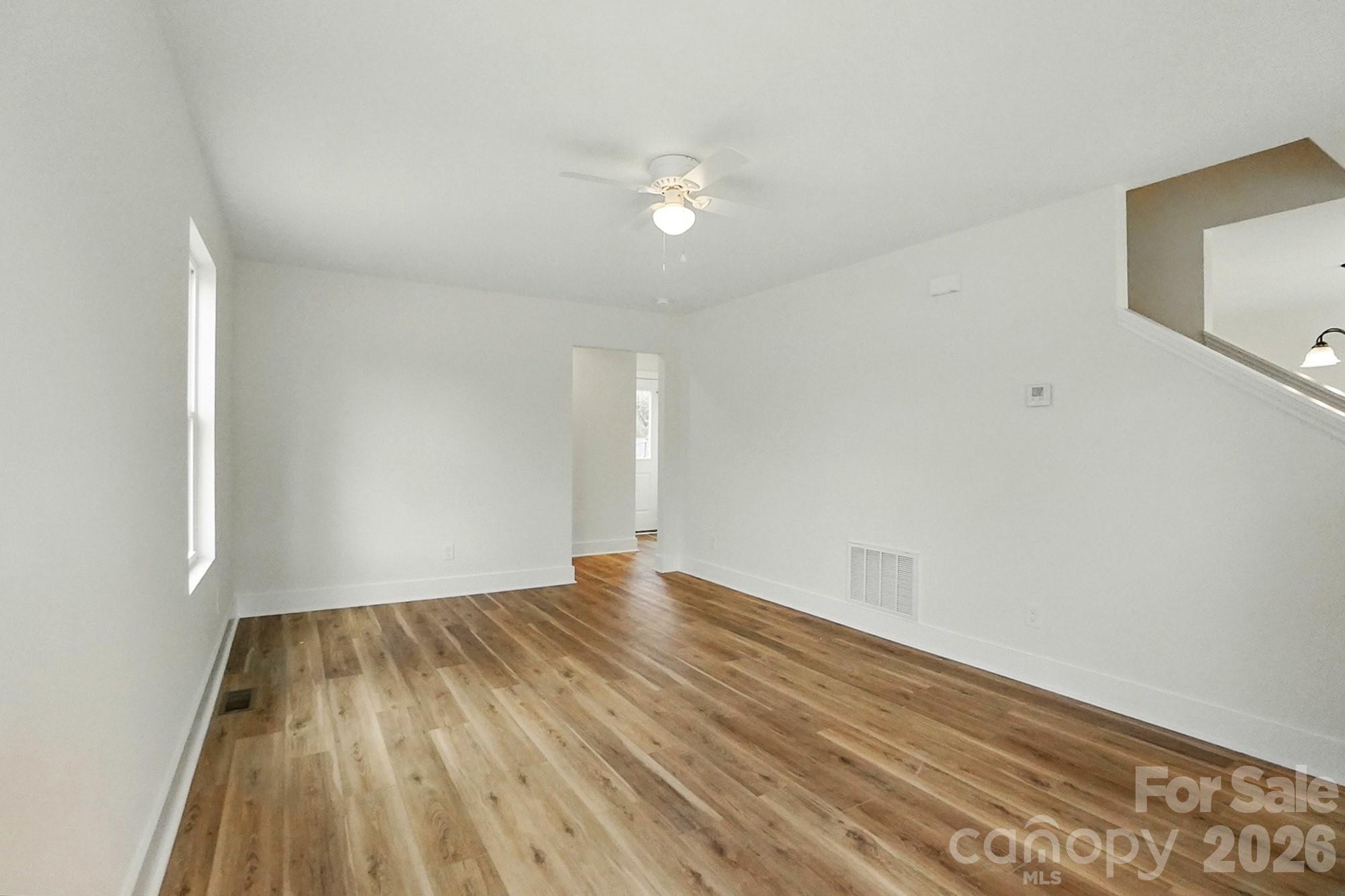 274 Bellhaven Place Northwest Concord, NC 28027 - Photo 4 of 27 wooden floor in a room
