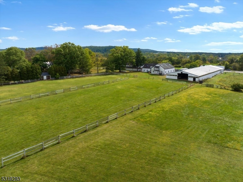 1850 Burnt Mills Road Bedminster, NJ 07921 - Photo 19 of 30 a view of a lake with a mountain