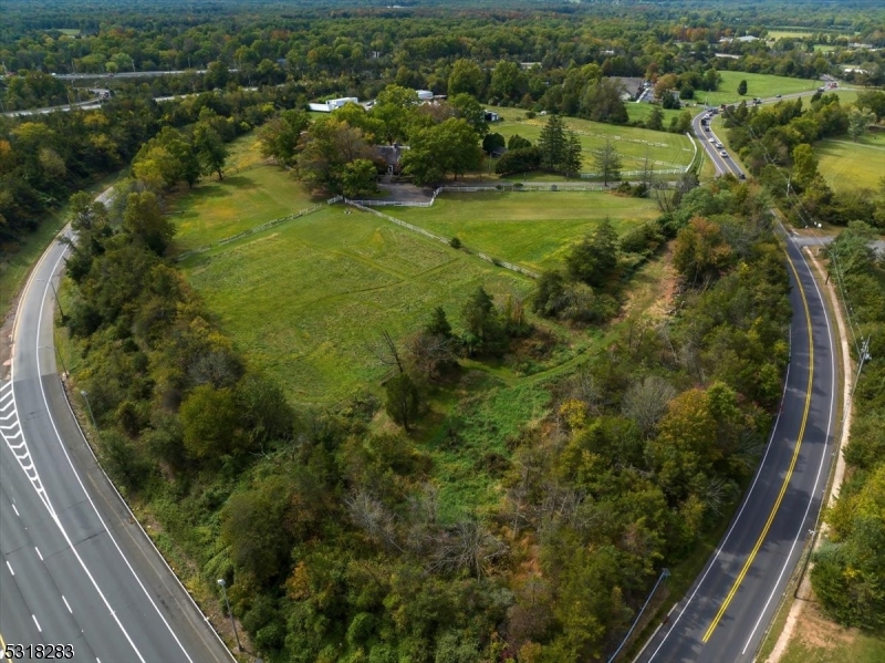 1850 Burnt Mills Road Bedminster, NJ 07921 - Photo 21 of 30 a view of a lake from a balcony