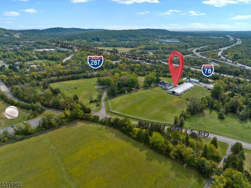1850 Burnt Mills Road Bedminster, NJ 07921 - Photo 27 of 30 a view of a street with a mountain