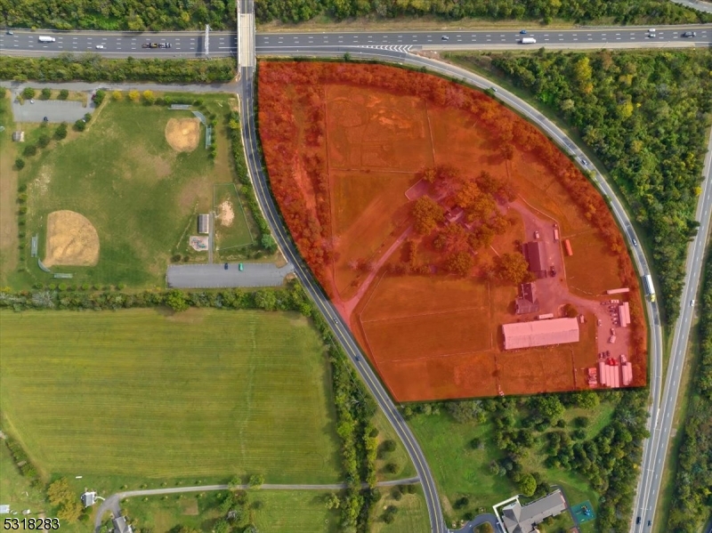 1850 Burnt Mills Road Bedminster, NJ 07921 - Photo 4 of 30 a view of a lake from a balcony