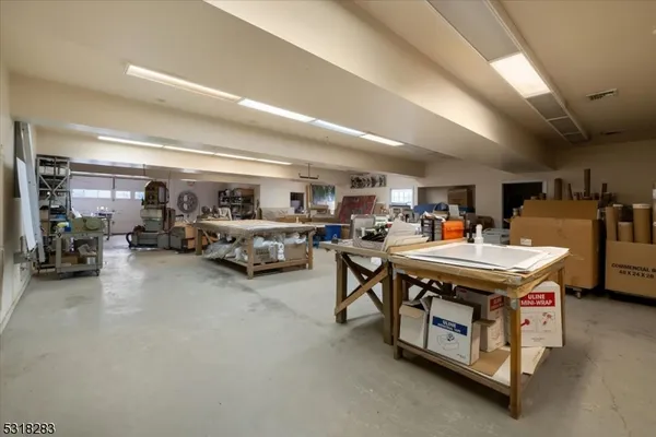 a room with furniture and a large window