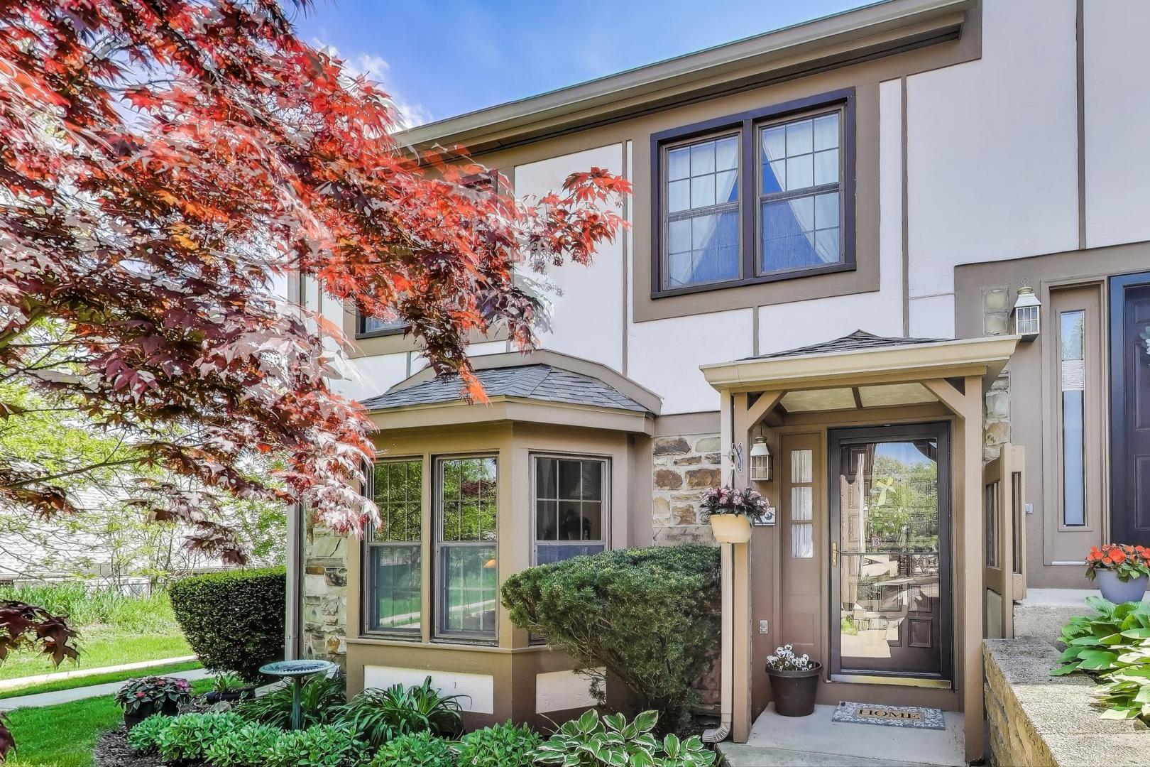 1022 Oakview Drive Wheaton, IL 60187 - Photo 1 of 20 front view of a house with a large window