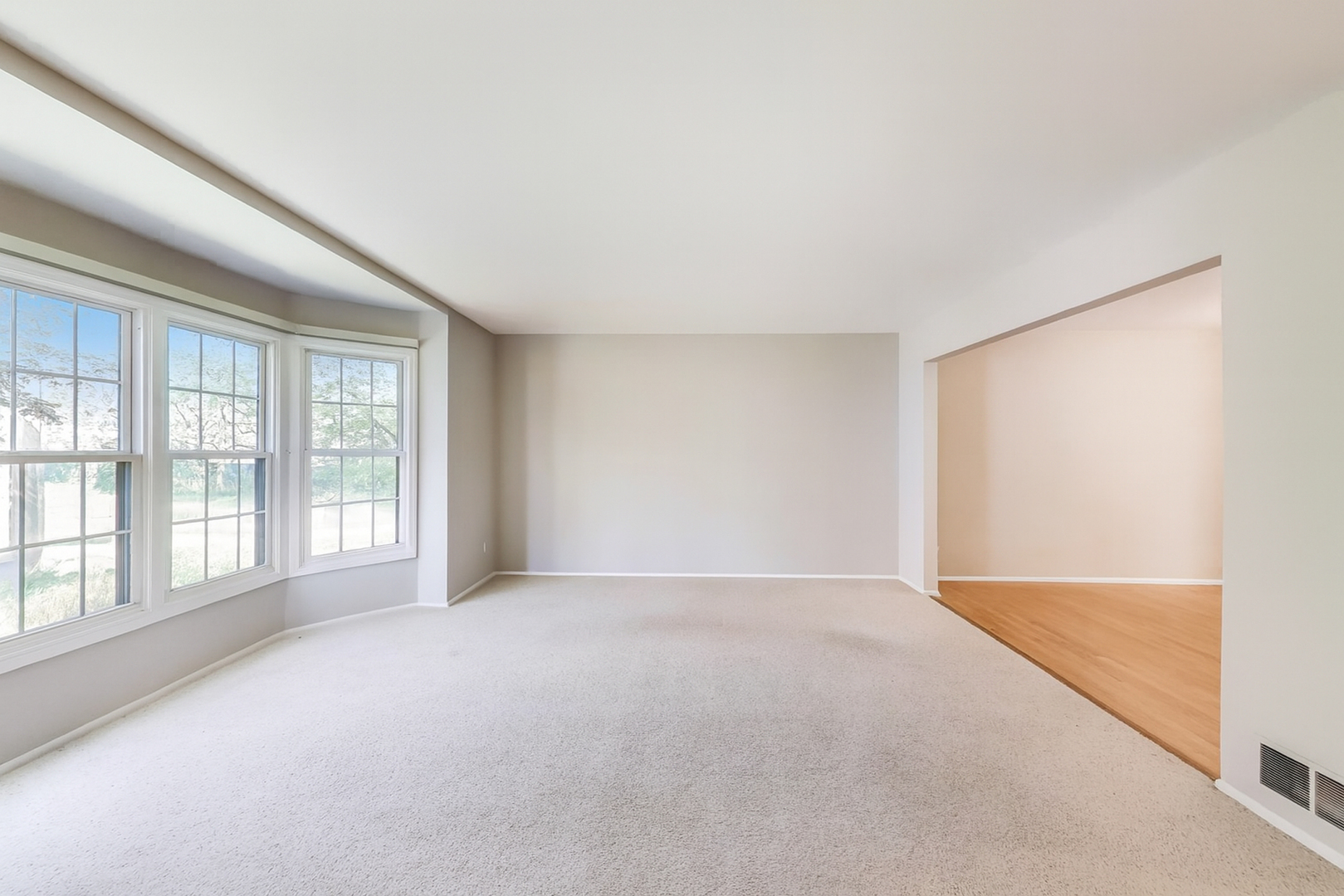 1022 Oakview Drive Wheaton, IL 60187 - Photo 3 of 20 an empty room with windows