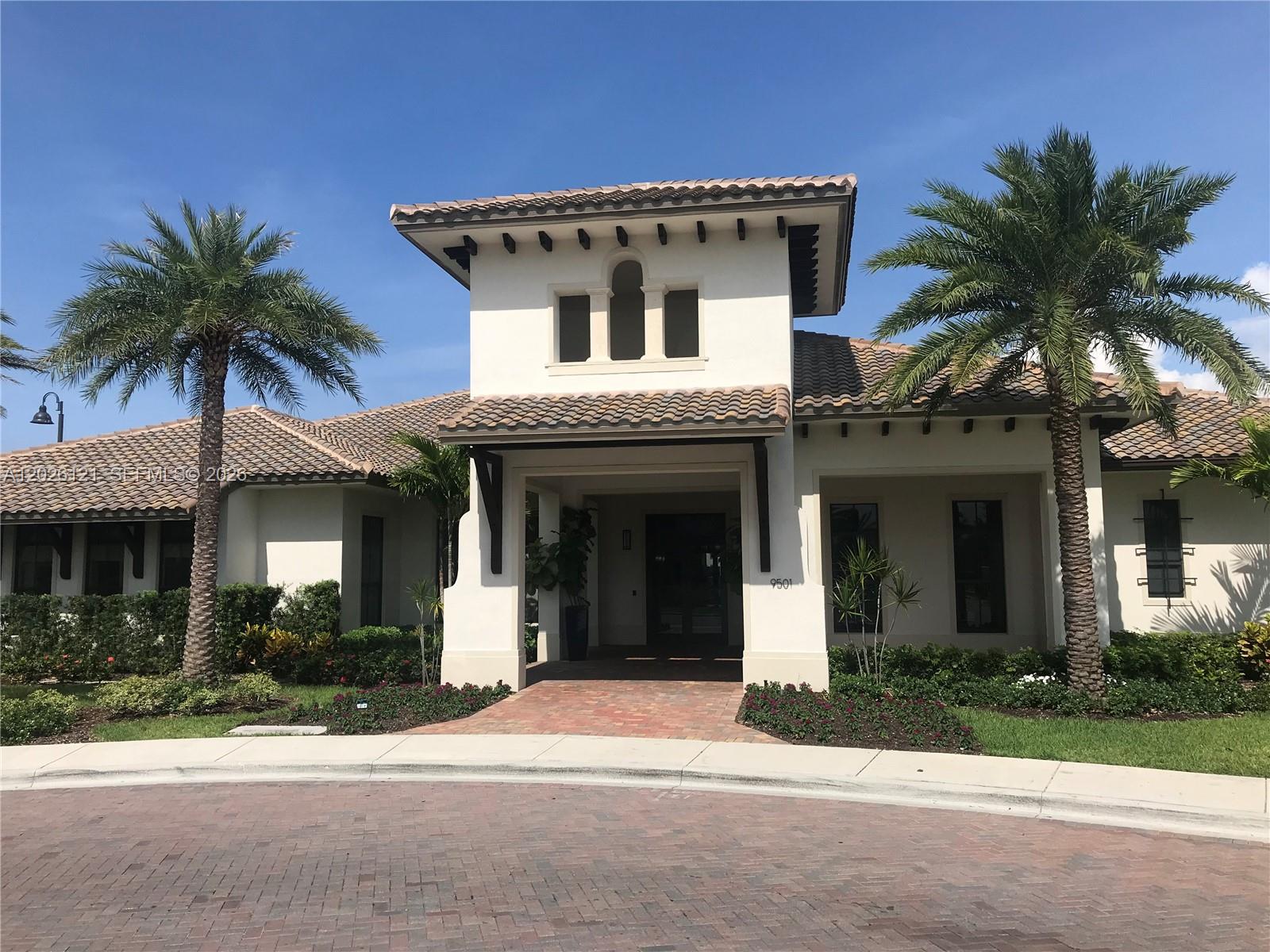 9307 West 33rd Way Hialeah, FL 33018 - Photo 19 of 23 front view of a house with a yard