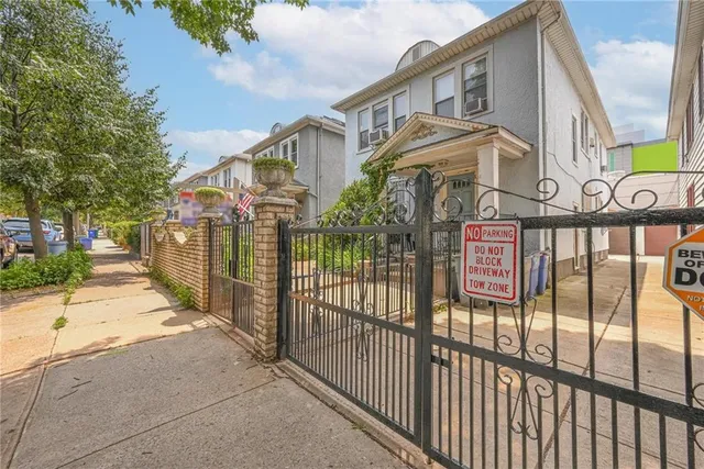 a view of a street with brick building