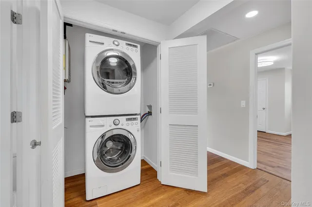 a view of livingroom with washer and dryer