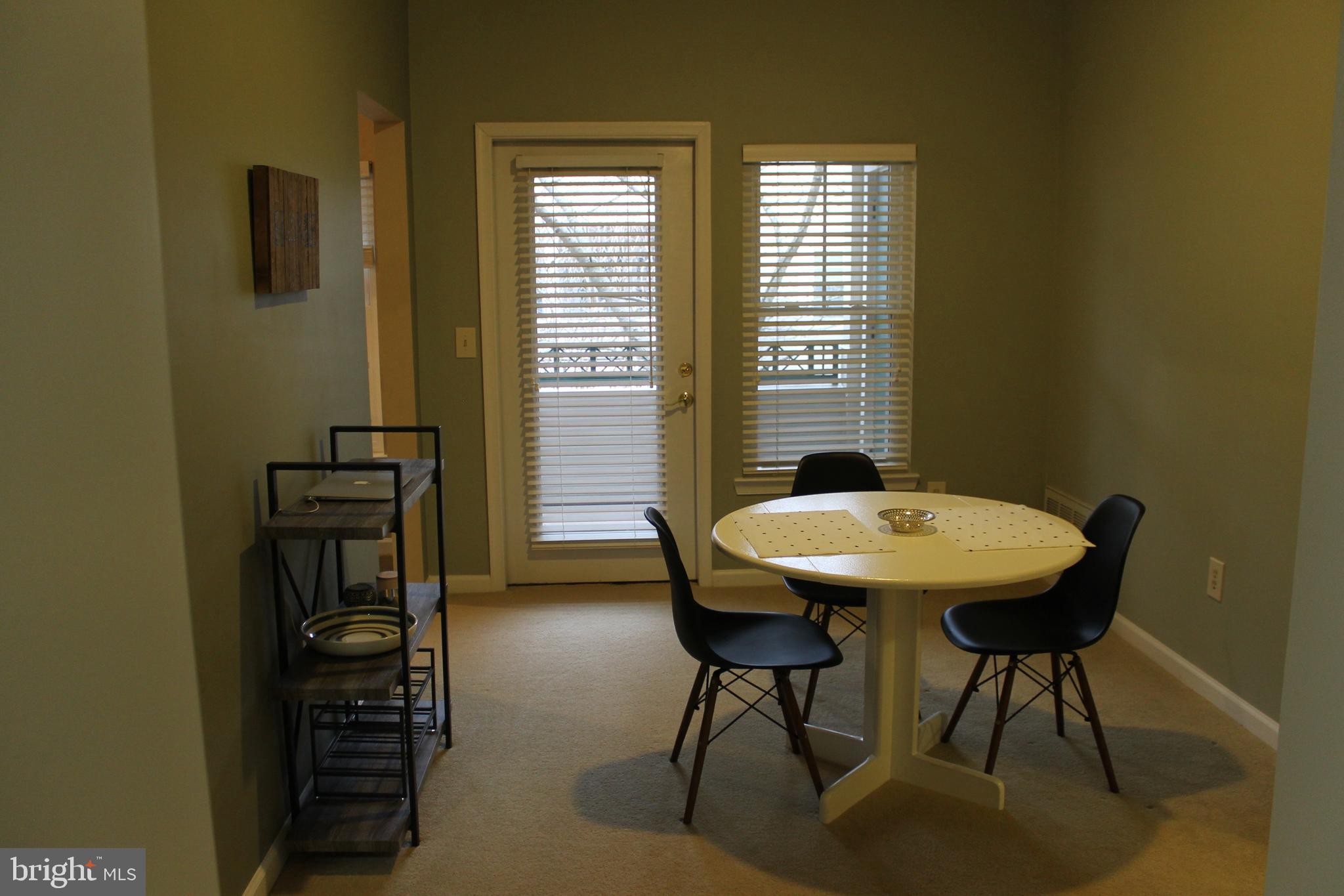 12004 Taliesin Place, Unit 25 Reston, VA 20190 - Photo 8 of 24 French Door Leads to Large Balcony