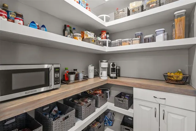 a patio with a table and chairs