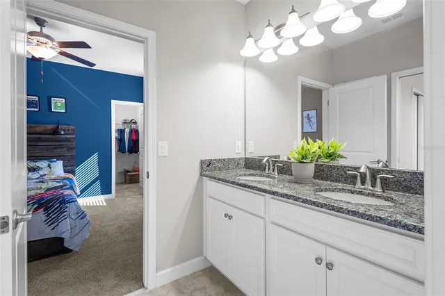 an aerial view of a house with garden space and street view