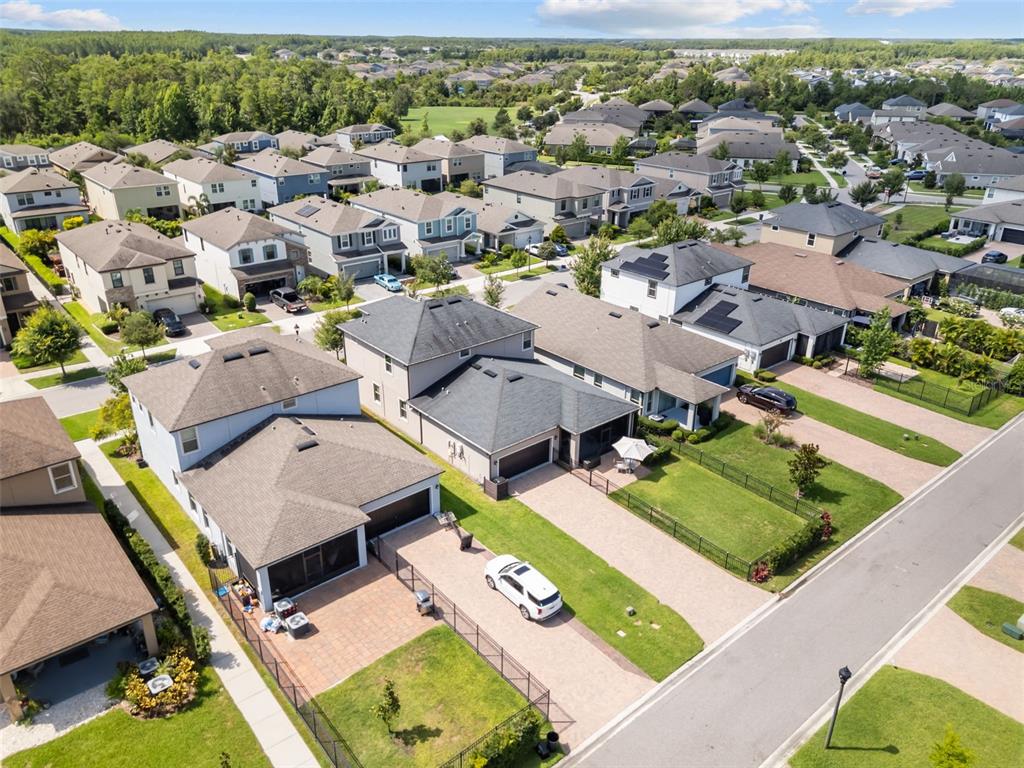 4465 Tubular Run Land O Lakes, FL 34638 - Photo 43 of 60 an aerial view of residential houses with outdoor space