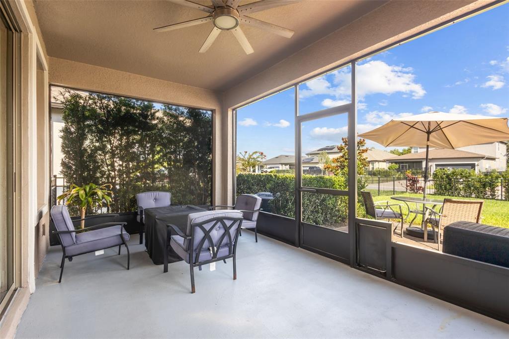 4465 Tubular Run Land O Lakes, FL 34638 - Photo 44 of 60 a dining room with furniture water view and balcony