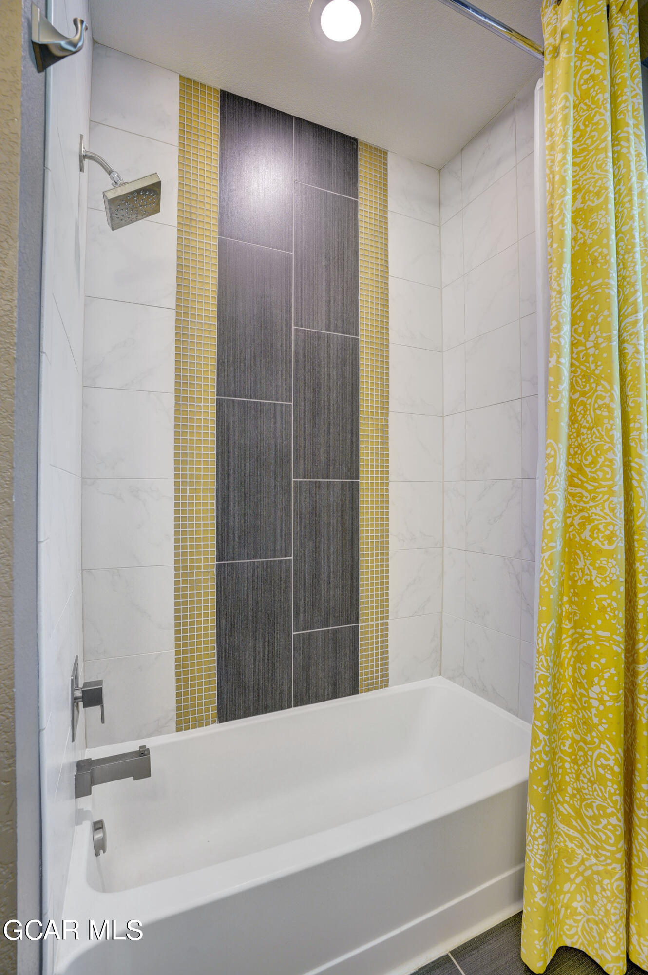 15526 Red Deer Drive Morrison, CO 80465 - Photo 17 of 82 a bathroom with a bathtub and shower