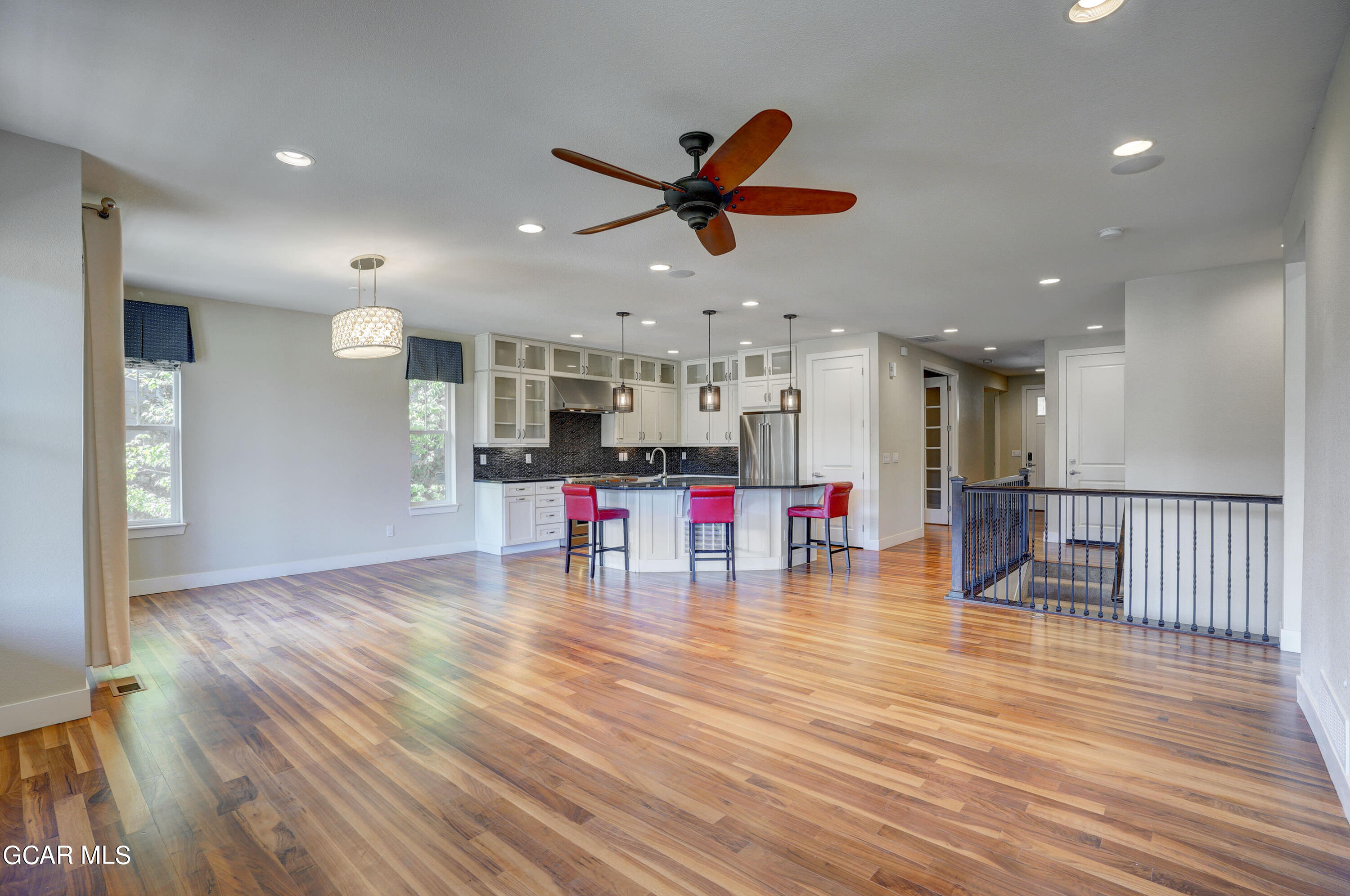 15526 Red Deer Drive Morrison, CO 80465 - Photo 28 of 82 a view of a room with wooden floor and kitchen view