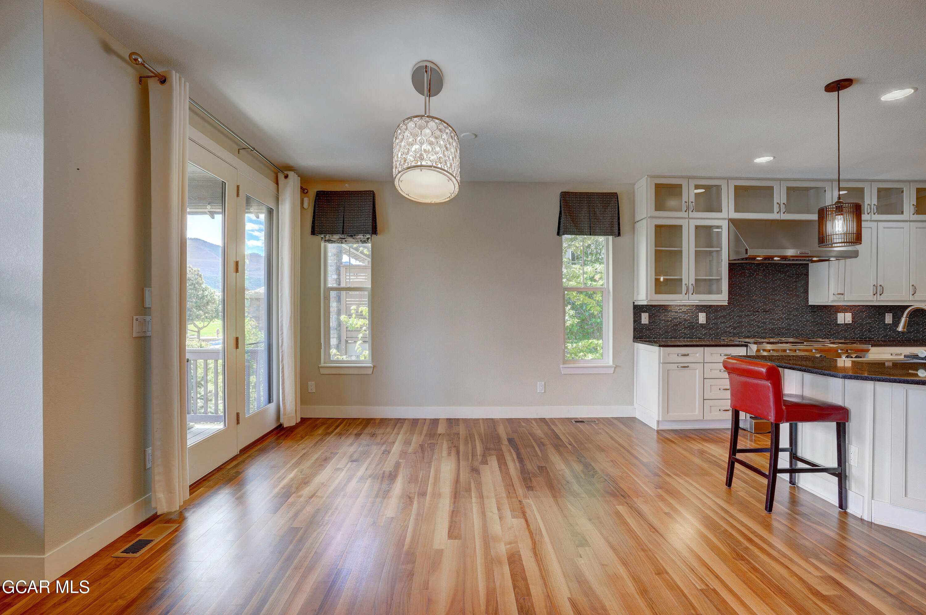 15526 Red Deer Drive Morrison, CO 80465 - Photo 29 of 82 a view of a room with wooden floor and a window