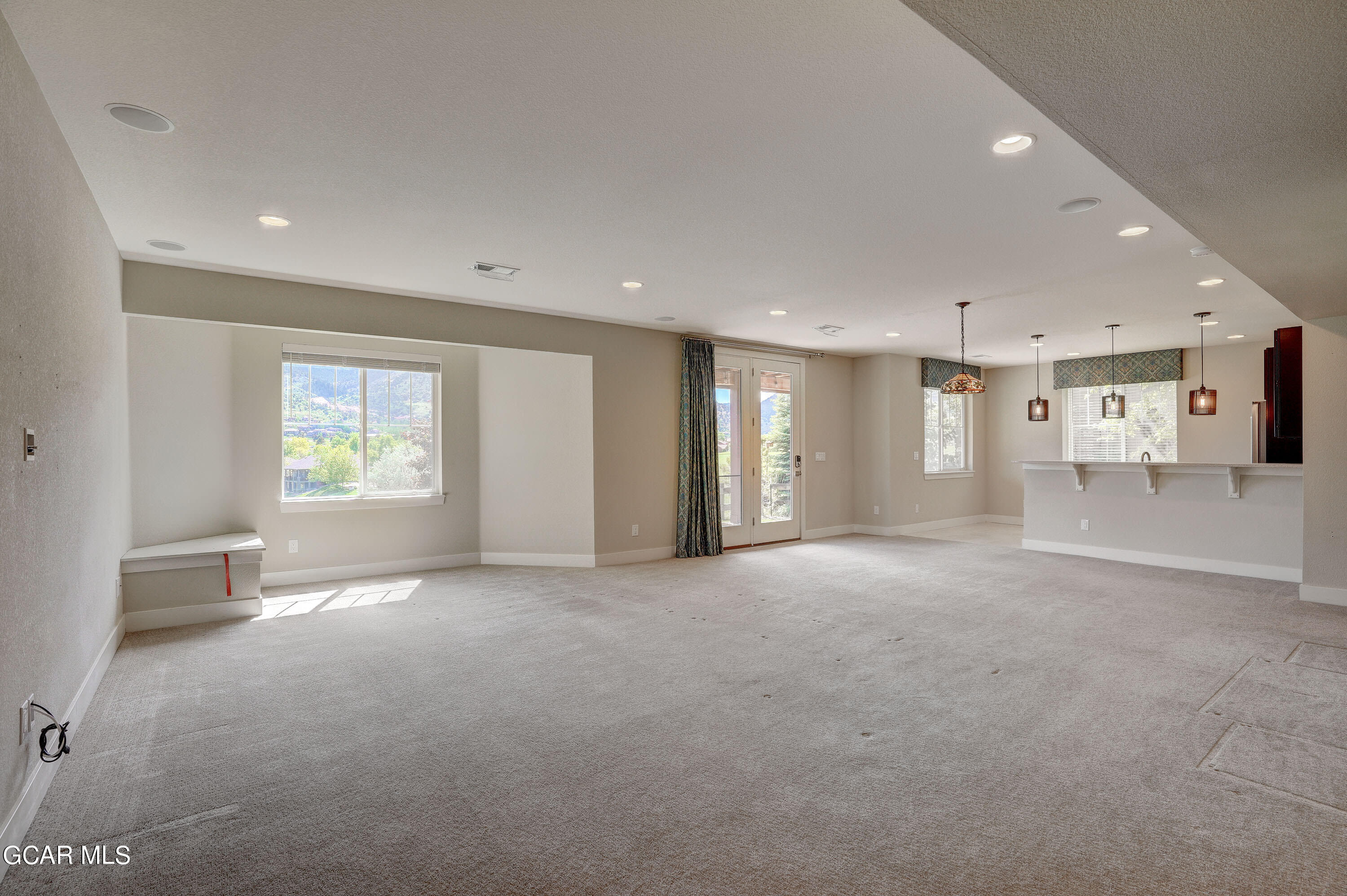 15526 Red Deer Drive Morrison, CO 80465 - Photo 37 of 82 a view of empty room with a fireplace