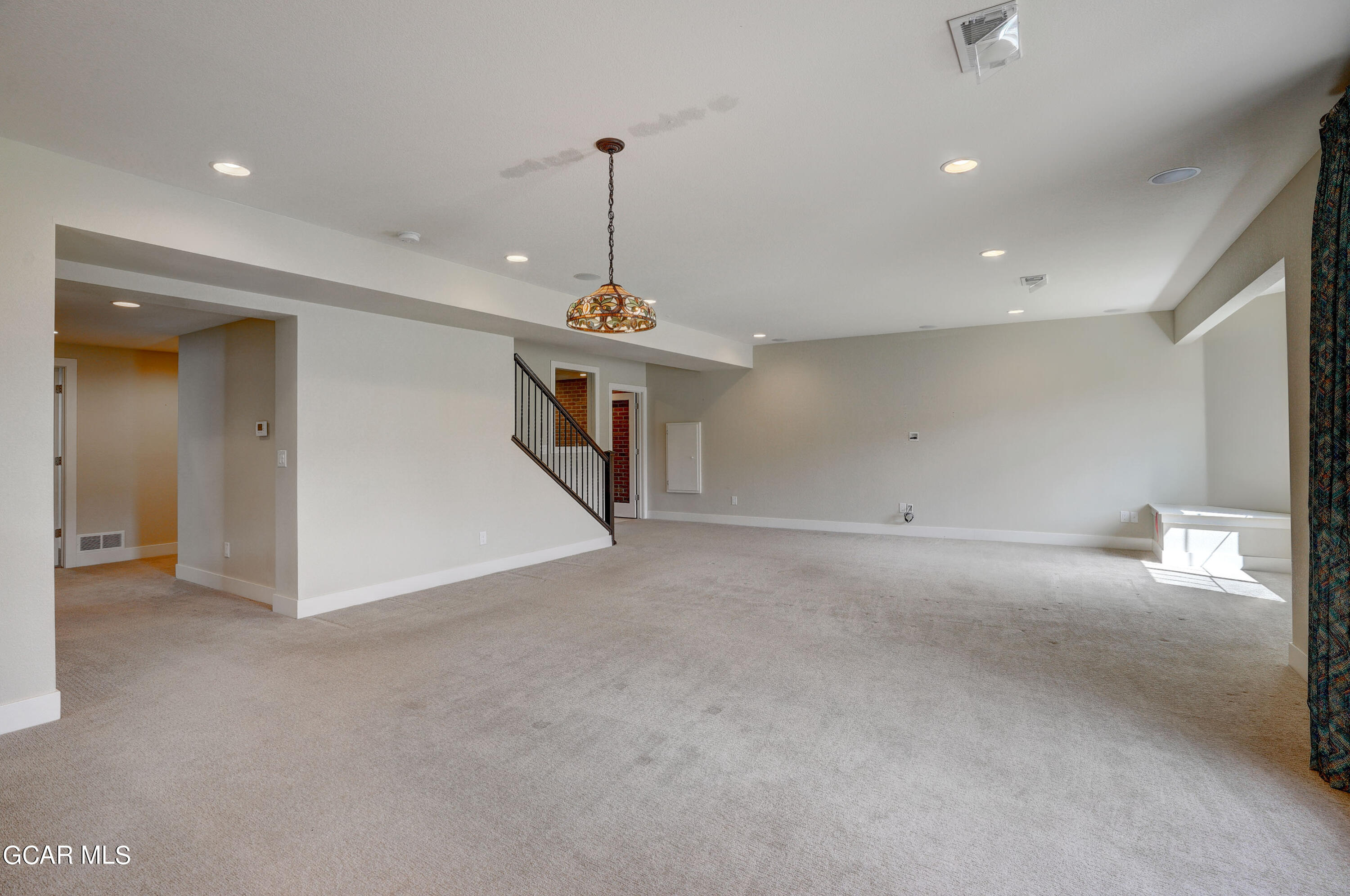 15526 Red Deer Drive Morrison, CO 80465 - Photo 38 of 82 a view of a kitchen with a sink and a ceiling fan